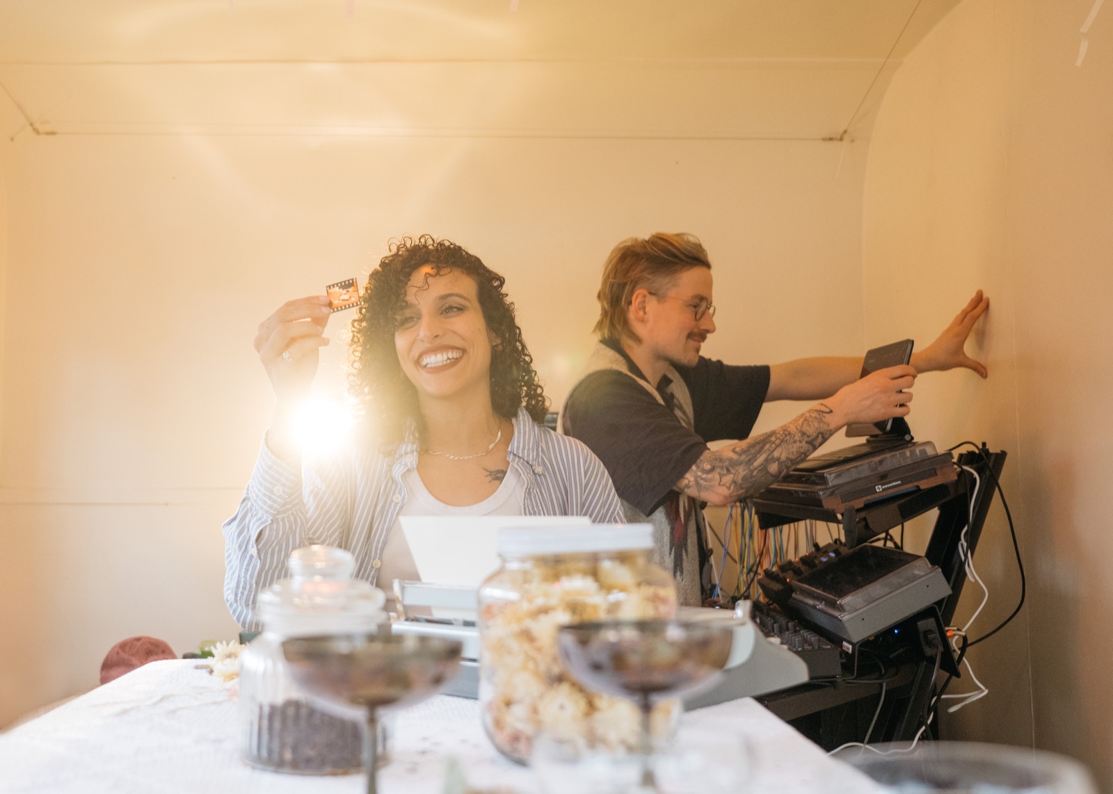 Sara holding a film negative to the light