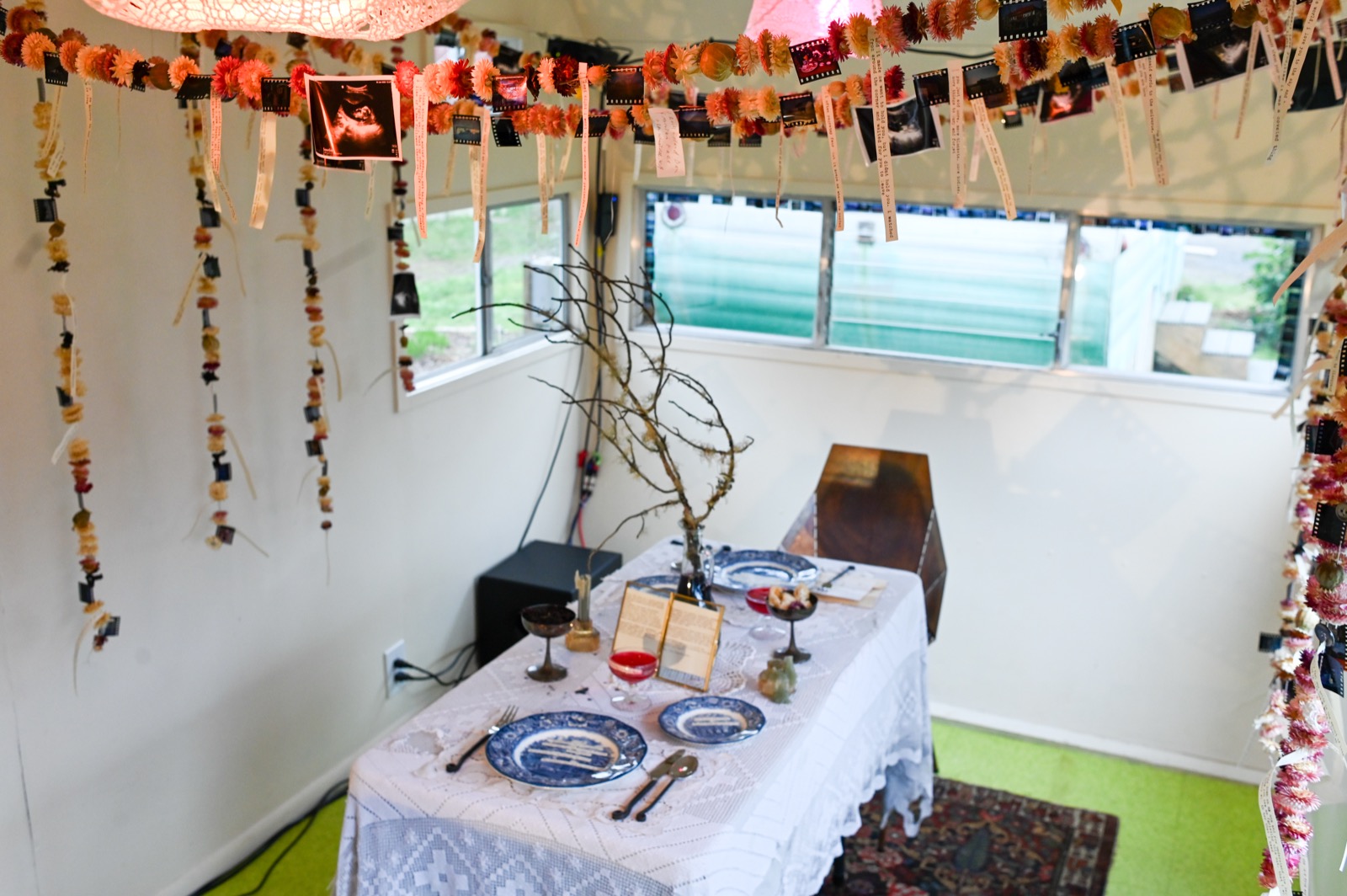 Trailer interior with garlands and table